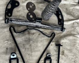 All the seat parts have been located for this very rare style seat that is correct for this model. The second spring has been located as well as the nickel plated spring housings. I hope to have this rare seat complete and leather covered  with all parts assembled in several weeks.